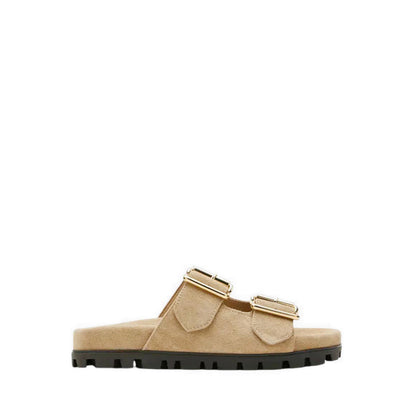 \Alaia Buckled Suede Slides - Beige